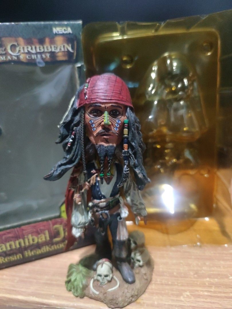 Neca Head Knockers Jack Sparrow (Category: Figurines & Statues) located in Quezon City. Submitted by gwift (Listing ID 1313170919, Image 3). Description: selling head knockers Jack sparrow opened to check, yellowing na po yung plastic clamshell due to storage, figure in perfect condition, 5 inches po can do meet ups at sm north or pick up sa project 7 qc.