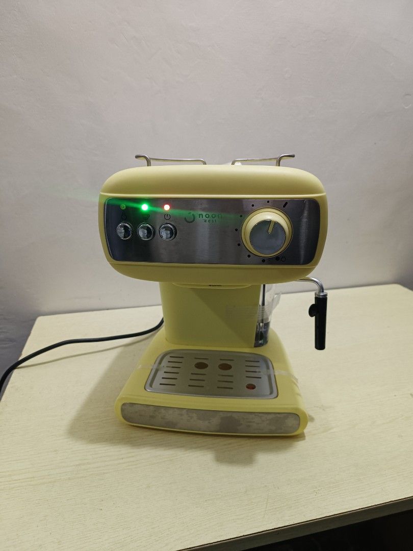 Noon East Espresso Coffee Machine (Category: Coffee Machines & Makers) located in Marikina City. Submitted by jameeeessssm (Listing ID 1391662548, Image 1). Description: For Sale Noon East Espresso Coffee Machine - It is a 15-bar espresso/cappuccino coffee maker with an 850W high-pressure system. It features a 1.2-liter removable water tank and a steam control knob. - The machine is designed to make various coffee beverages, including espresso, c