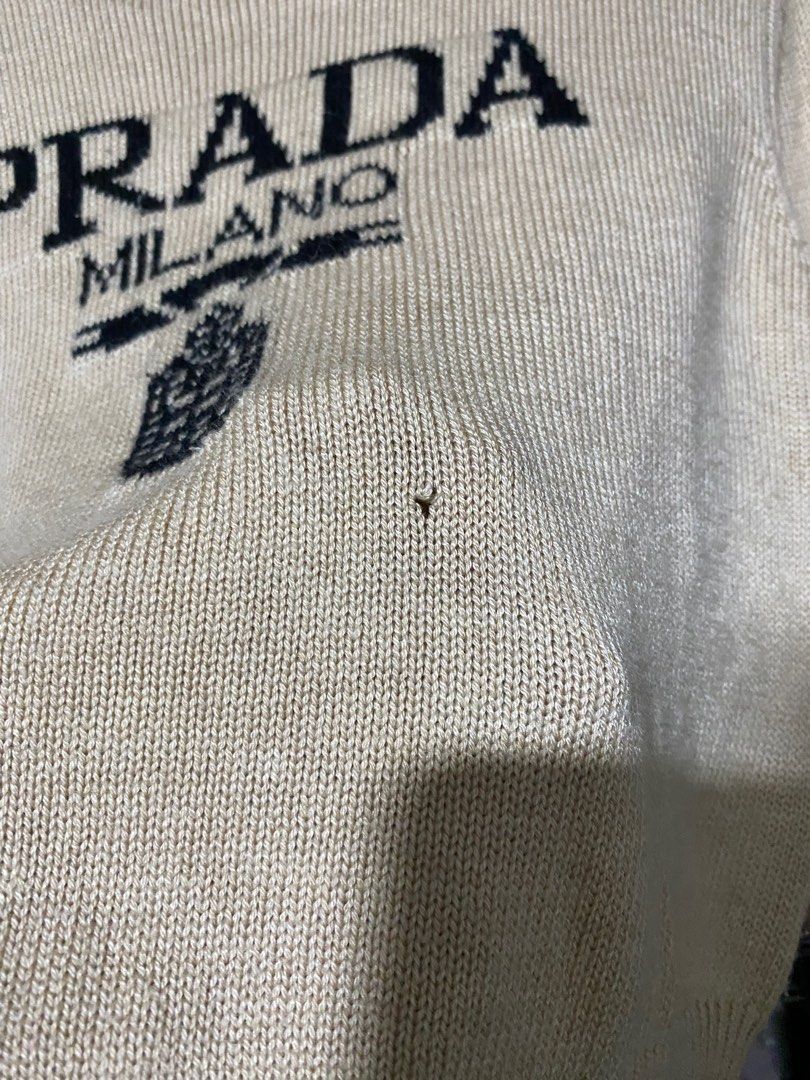 Prada knitted (Category: Luxury Apparel) located in Baguio. Submitted by fullroom.dgs (Listing ID 1391568549, Image 3). Description: Prada knitted good condition ( with hole) please check photos size: small-med.