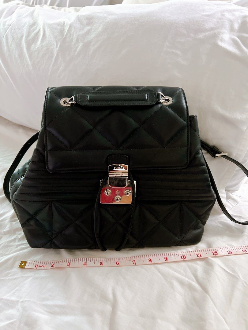 Preloved Furla backpack (Category: Luxury Bags & Wallets) located in Antipolo. Submitted by minimalist.chic (Listing ID 1391740543, Image 2). Description: Preloved, slightly used. Rfs: too many bags.