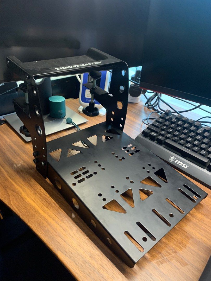 Thrustmaster Flight Control Bracket (Category: Controllers) located in Singapore. Submitted by KopiRiteClub_Kensington (Listing ID 1391651475, Image 2). Description: Perfect for the airbus throttle and flight stick. One last piece Self collect on appointment .