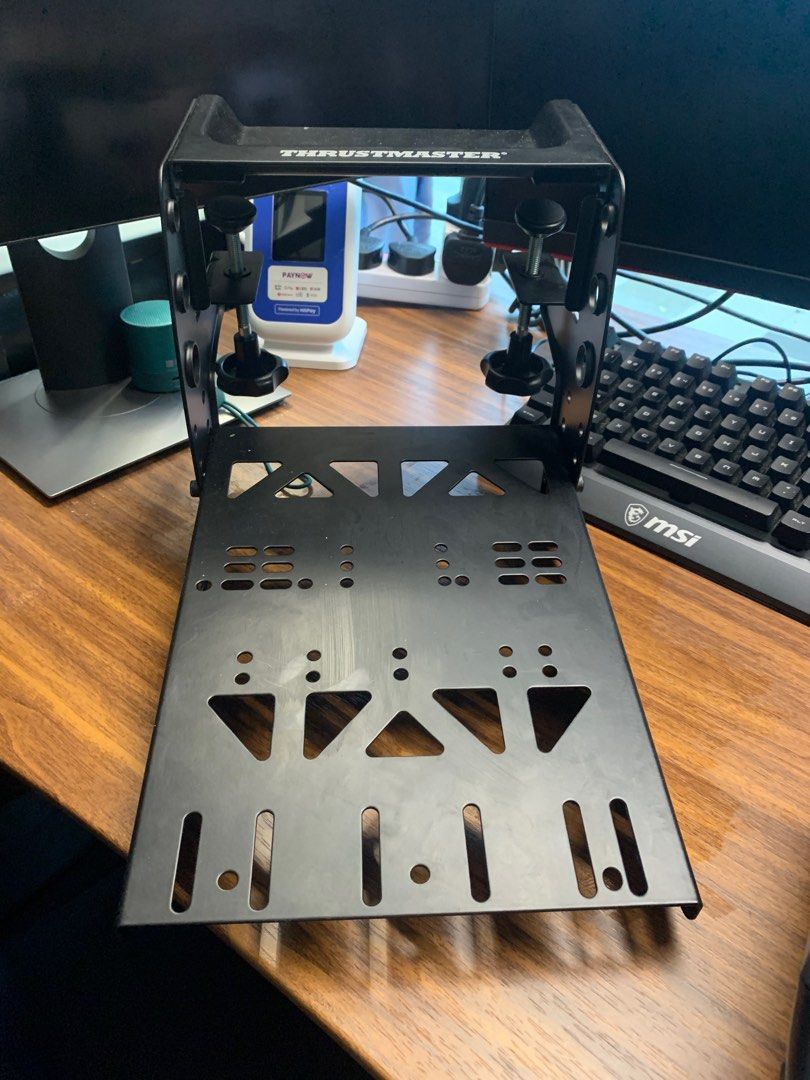 Thrustmaster Flight Control Bracket (Category: Controllers) located in Singapore. Submitted by KopiRiteClub_Kensington (Listing ID 1391651475, Image 3). Description: Perfect for the airbus throttle and flight stick. One last piece Self collect on appointment .