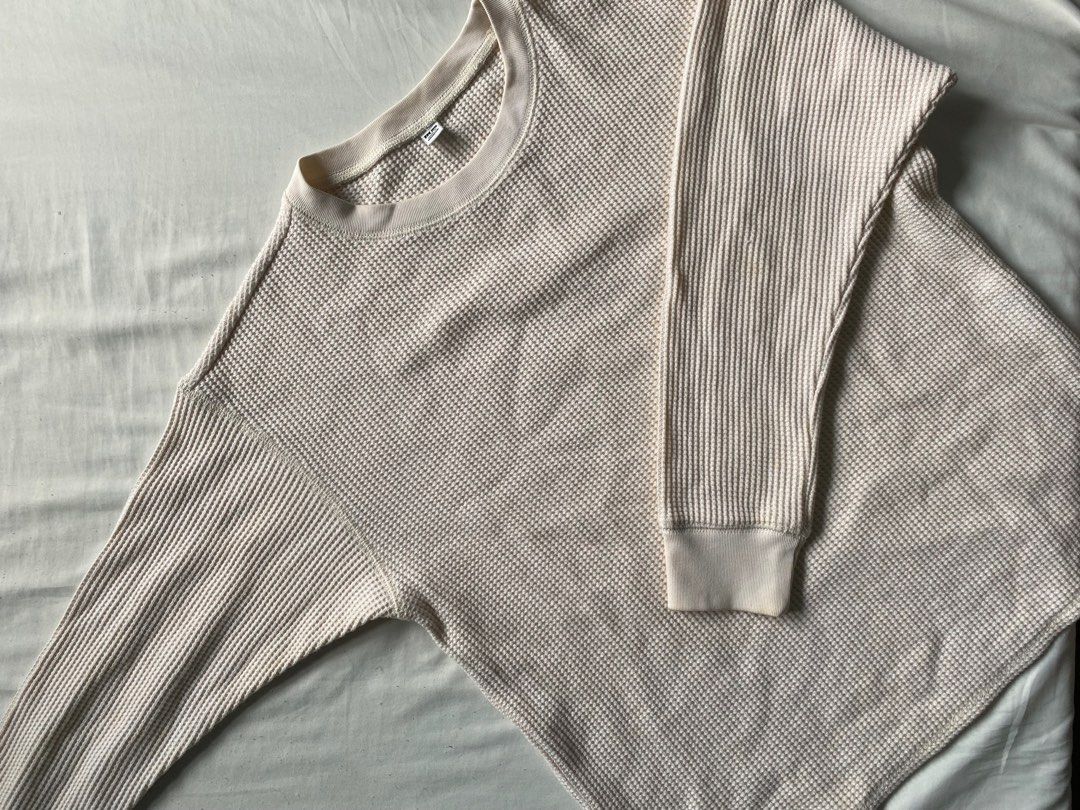 Uniqlo Waffle Sweater (Category: Coats, Jackets and Outerwear) located in Quezon City. Submitted by preluvables (Listing ID 1391624795, Image 2). Description: Fixed Price Description - M women size (check pics for measurements) - Color (Cream) - Waffle type - no flaws (check pics) Meet Up around katipunan area only Can ship thru: Lalamove, gogoexpress Payment: gcash or maya only Stricly no refunds & no low ballers .