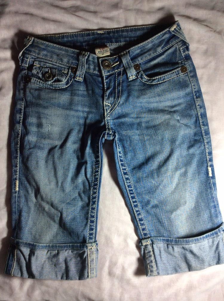 Vintage True Religion Joey Jorts Cutoff Denim Shorts Size 27 Made in USA Y2K (Category: Jeans) located in Manila. Submitted by cleverlion-cf34 (Listing ID 1391662509, Image 2). Description: Brand: True Religion Model/Style: Joey Jorts – Women’s denim shorts Size: 27 (fits ~26–27 inch waist) Made in: USA (imported fabric) Material: 99% Cotton, 1% Elastin (slight stretch) Color/Wash: Classic medium blue wash Length: Mid-thigh / Bermuda style (cuffe