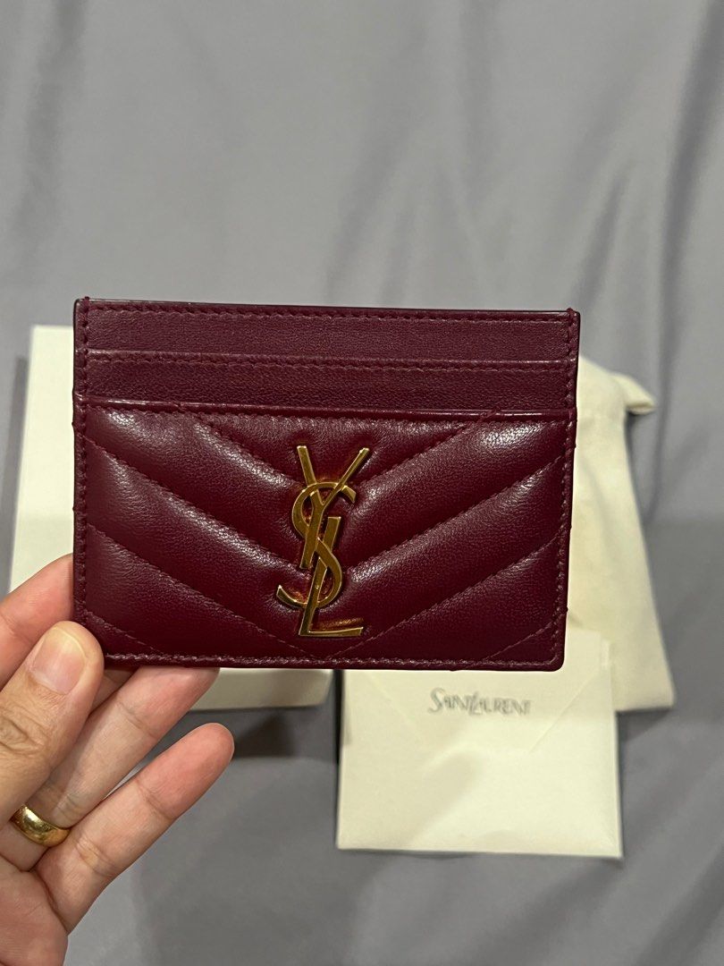 YSL card holder (Category: Luxury Bags & Wallets) located in Cavite. Submitted by joancelestial (Listing ID 1391599182, Image 1). Description: Yves Saint Laurent Card holder Cherry red Used once! Ships from Cavite Bought from Korea. Complete inclusion (box, paperbag, store receipt, dustbag and care card).