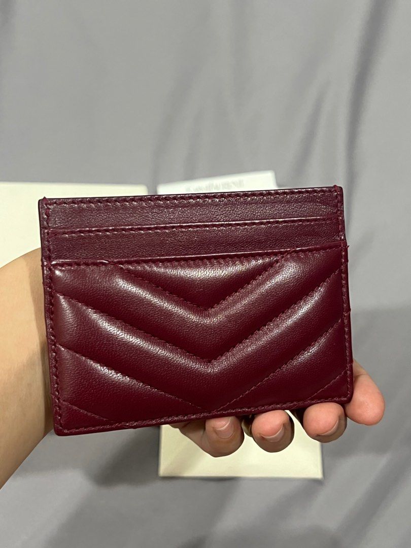 YSL card holder (Category: Luxury Bags & Wallets) located in Cavite. Submitted by joancelestial (Listing ID 1391599182, Image 2). Description: Yves Saint Laurent Card holder Cherry red Used once! Ships from Cavite Bought from Korea. Complete inclusion (box, paperbag, store receipt, dustbag and care card).
