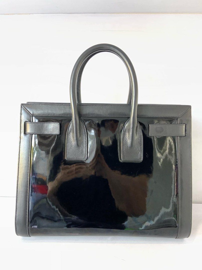 YSL Sac de Jour Patent Leather (Small) (Category: Luxury Bags & Wallets) located in Quezon City. Submitted by maimaidp (Listing ID 1391611734, Image 2). Description: Purchased from Takayama, in Fukoka, Japan. I sent it to Bag Compartment for Bag Spa treatment. So it looks✨ good✨ Almost perfect condition! RFS: only used it twice! 😅 takaw mata i guess? -no lock and no pouch Negotiable. .