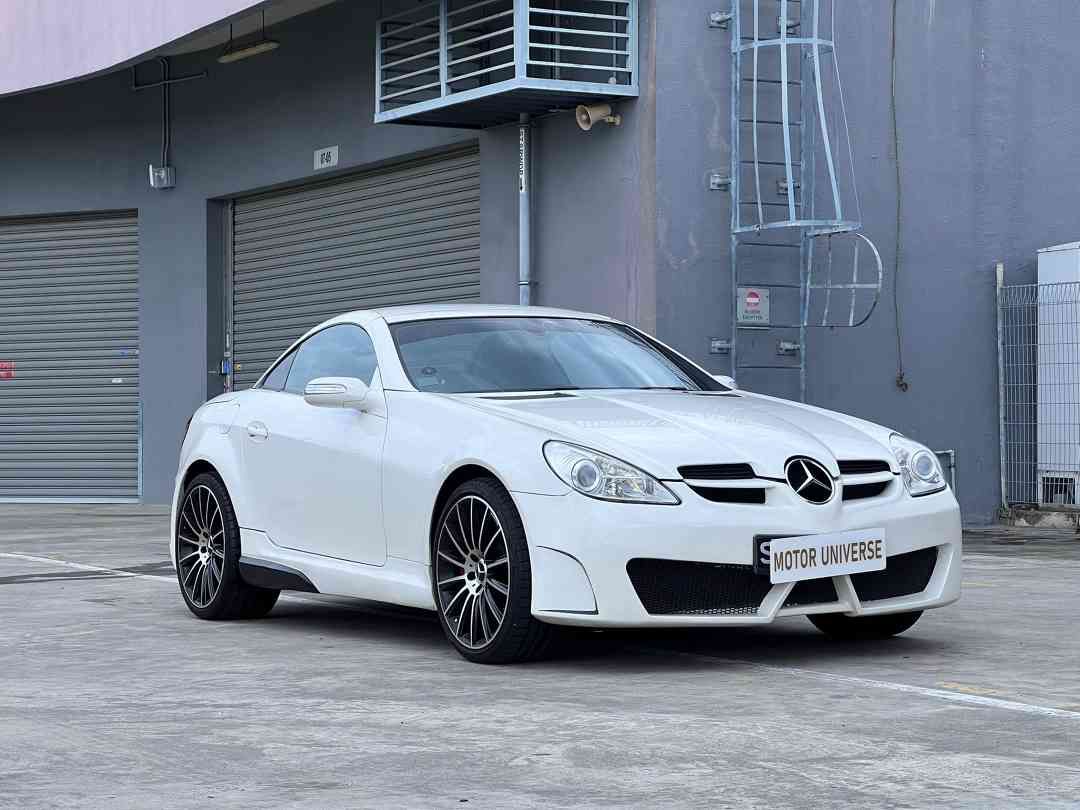 Mercedes-Benz SLK-Class SLK200 Kompressor (A) (Category: Used Cars) located in Singapore. Submitted by motoruniverse (Listing ID 1410797639, Image 2). Description: Showroom: CARRO CENTER 60 JALAN LAM HUAT #04-37/38 CARRO CENTER Singapore 737869 Superb condition! Fully reupholstered and refurbished by previous owner! Relatively new pearl white paintwork! Low genuine mileage done! Wear and tears receipts done up and kept! LTA certified Piecha exhau