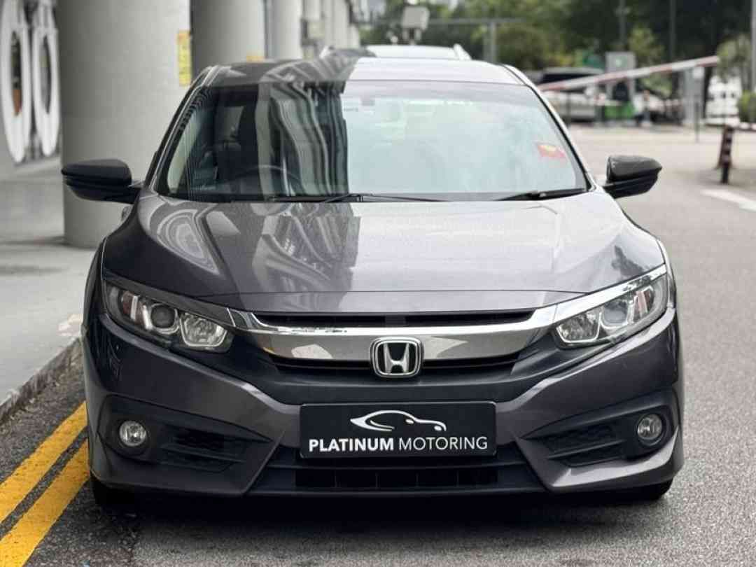 Honda Civic 1.6 i-VTEC (A) (Category: Used Cars) located in Singapore. Submitted by platinummotoringsg (Listing ID 1449427595, Image 1). Description: Interest rates from as low as 1.28%! Full loan available. Choose from bank or in-house financing! Proudly awarded Sgcarmart Premium Dealer for 3 consecutive years since 2023!Singapore's largest pre-owned dealership with 500+ listings, we offer higher trade-in value, better approval rates, and some o