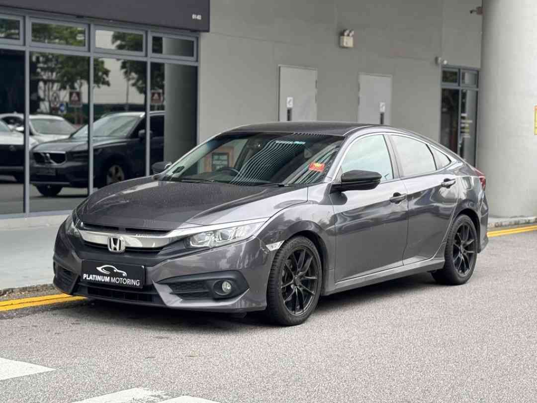 Honda Civic 1.6 i-VTEC (A) (Category: Used Cars) located in Singapore. Submitted by platinummotoringsg (Listing ID 1449427595, Image 2). Description: Interest rates from as low as 1.28%! Full loan available. Choose from bank or in-house financing! Proudly awarded Sgcarmart Premium Dealer for 3 consecutive years since 2023!Singapore's largest pre-owned dealership with 500+ listings, we offer higher trade-in value, better approval rates, and some o