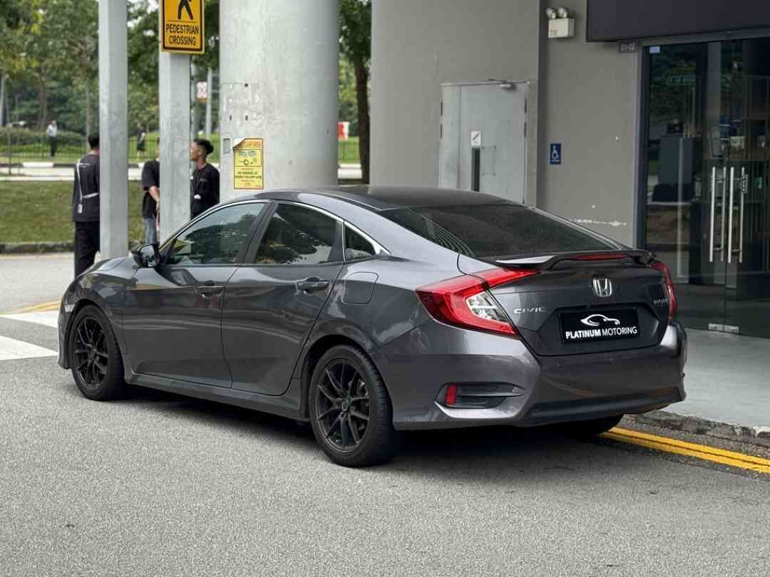 Honda Civic 1.6 i-VTEC (A) (Category: Used Cars) located in Singapore. Submitted by platinummotoringsg (Listing ID 1449427595, Image 3). Description: Interest rates from as low as 1.28%! Full loan available. Choose from bank or in-house financing! Proudly awarded Sgcarmart Premium Dealer for 3 consecutive years since 2023!Singapore's largest pre-owned dealership with 500+ listings, we offer higher trade-in value, better approval rates, and some o