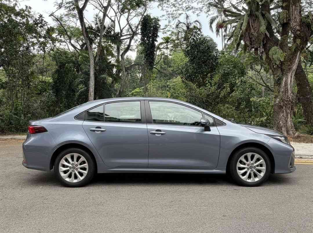 Toyota Corolla Altis 1.6 Standard (A) (Category: Used Cars) located in Singapore. Submitted by carousellcars (Listing ID 1451776851, Image 3). Description: Highly reliable, mid-sized family sedan. 1.6-liter Dual VVT-i Continuous Variable Transmission (CVT) and front-wheel drive (2WD). Well taken care of by owner. Low milage. Fuel saving. View to believe! Features: 1,598 cc inline 4-cylinder 16-valve DOHC 96 kW / 129 bhp at 6,400 rpm 159 Nm at 4,2