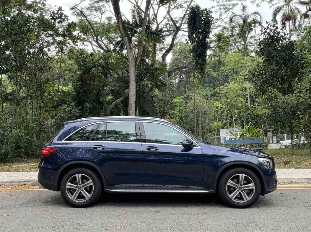 Mercedes-Benz GLC-Class GLC250 4MATIC (A) (Category: Used Cars) located in Singapore. Submitted by carousellcars (Listing ID 1452610424, Image 3). Description: A premium, mid-sized luxury crossover SUV. This specific designation denotes a combination of the vehicle's standard luxury specifications, factory 18-inch alloy wheels (R18), and it's high-performance LED lighting package. Features: 2.0-liter inline-4 turbocharged engine. 155.0 kW/207 bhp