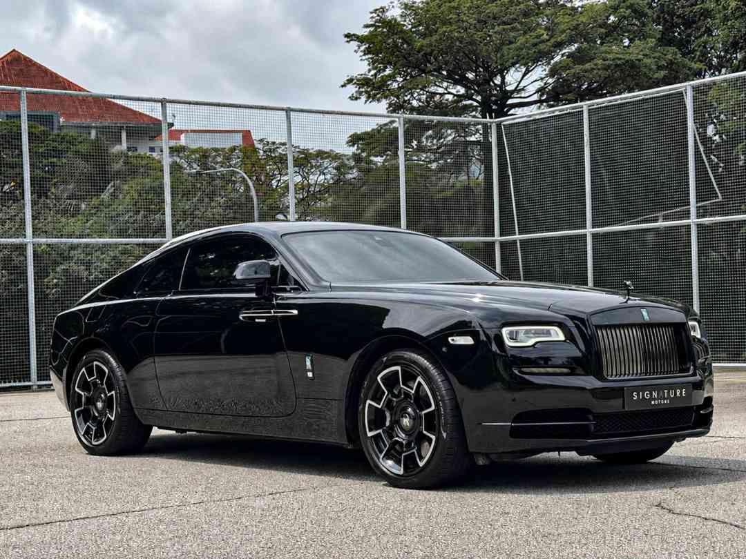 Rolls-Royce Wraith F1 Auto Cars Edition 6.6 V12 (A) (Category: Used Cars) located in Singapore. Submitted by signaturemotors (Listing ID 1437668371, Image 2). Description: Showroom: 237 ALEXANDRA ROAD 237 Alexandra Road #02-04 Singapore 159929 Black Badge Model Not Your Usual Rolls Royce Wraith! Definitely One Of The Luxurious And Fastest Rolls Royce In Town! Low Mileage! Fully Hand Built! Fully Blacked Out Accents With Custom Coloured Steering W
