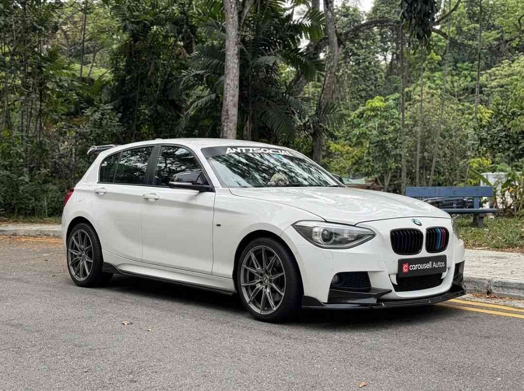 BMW 1 Series Hatchback 118i 5dr (A) (Category: Used Cars) located in Singapore. Submitted by carousellcars (Listing ID 1450396590, Image 3). Description: We pride ourselves on offering some of the most competitive deals in the market, ensuring that you can make informed decisions with complete confidence. Every step of the purchasing process is handled with professionalism and integrity, reflecting our commitment to building long-term trust and l