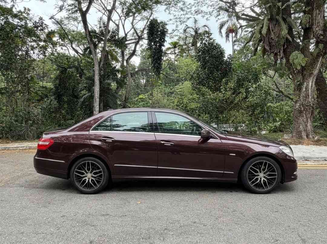 Mercedes-Benz E-Class Saloon E250 CGI Elegance (A) (Category: Used Cars) located in Singapore. Submitted by carousellcars (Listing ID 1452079778, Image 3). Description: Well-maintained 2010 Mercedes-Benz E250 CGI offering a smooth, powerful and comfortable drive. Spacious luxury sedan with elegant styling, excellent fuel efficiency for its class and a refined driving experience. Regularly serviced, clean interior and exterior, ideal for daily dri