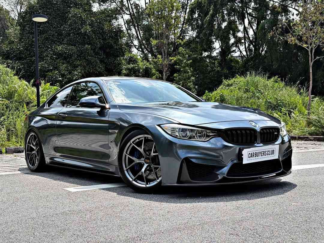 BMW M Series M4 Coupe 3.0 (A) (Category: Used Cars) located in Singapore. Submitted by carbuyersclub (Listing ID 1451724068, Image 1). Description: Stunning Metallic white M4 clad in Midnight Grey wrap! Immaculate condition, OCD owner well taken care and fully serviced at RENOWN powerhaus. Low owner count! Never seen track before. Tastefully done up mods to amplify the exhilarating performance that the M4 delivers! Stock parts to be passed onto t