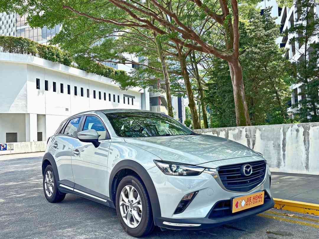 Mazda CX-3 1.5 Elegance (A) (Category: Used Cars) located in Singapore. Submitted by jiehengmotoring (Listing ID 1437830781, Image 2). Description: Latest Facelifted Snowflake White CX-3 Elegance 1.5L GEM! Full Eurokars Agent Servicing Done Till Jun 2025! Comes Engine And Gearbox Warranty! Buy From A 5/5 Star Review Dealership Today Immediate Car Ownership Transfer On Collection Day Regardless Of Loan Or Cash Deal! New Road Tax Till Oct 2026! Fea