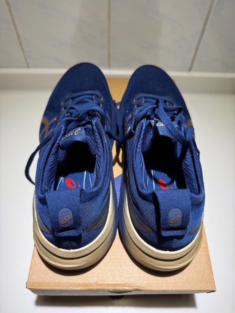 Asics Gel-Kayano 31 Platinum Running Shoes - Size 9 (Category: Sneakers) located in Singapore. Submitted by activea (Listing ID 1412980678, Image 3). Description: - Like new Asics Gel-Kayano 31 Platinum - Used only twice - total 15km - Size: US 9 - Color: Blue with gold accents - Includes original box - Suitable for running and everyday use - Feel free to ask any questions!.