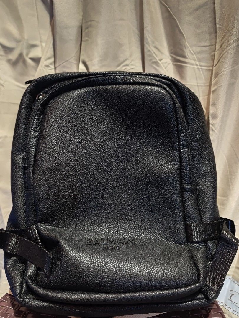 Authentic Balmain Paris Black Backpack (Category: Backpacks) located in Davao. Submitted by bletti_bletti (Listing ID 1412957058, Image 1). Description: Selling my preloved Balmain Large Backpack. I have used this thrice and I find this too big for a petite girl like me. Condition: 8/10 -with crease due to storage (stored inside the pouch and stacked together with my other bags) -occasional color transfer caused by the linings of the straps (this