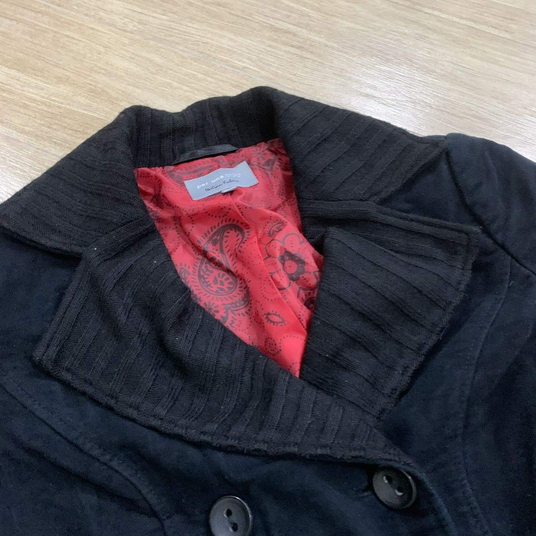Black Double-Breasted Jacket (Category: Coats, Jackets and Outerwear) located in Quezon City. Submitted by reply_1982 (Listing ID 1412903041, Image 3). Description: - Stylish black double-breasted jacket - Unique collar design and decorative buttons - Vibrant red paisley lining - Made of a soft, possibly corduroy-like material - Adds a touch of sophistication to any outfit Length: 57cm Chest: 43cm Waist: 42cm Sleeves: 58cm.