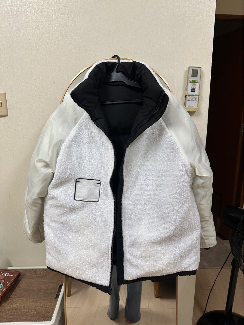 Brand New Reversible Puffer Jacket (Category: Coats, Jackets and Outerwear) located in Manila. Submitted by archivemanila (Listing ID 1413020425, Image 2). Description: UNISEX! Regular size Medium or Asian XL *For reference, I'm a regular womens medium. My bf also tried this on and it fits him perfectly. He wears L-XL. - Reversible design: Black bubble or white fleece side. - Features a high collar and zip-up front. - One side: Black. - Other sid