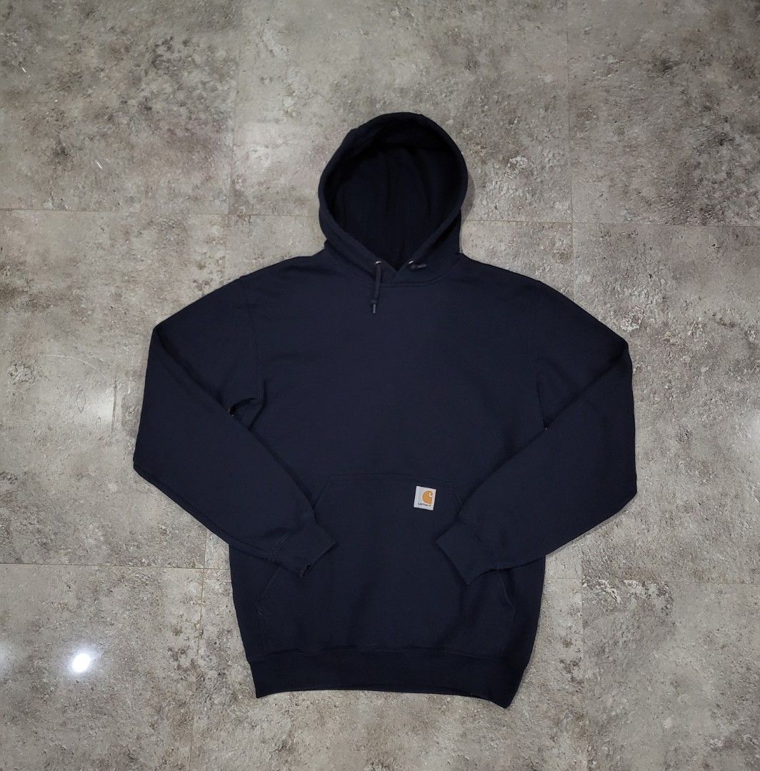 Carhartt Hoodie - Navy Blue (Category: Hoodies) located in Baguio. Submitted by lakobado05766 (Listing ID 1412964021, Image 1). Description: - Carhartt navy blue hoodie - Size: Small - Features: - Hood with drawstring - Front pocket - Carhartt logo patch - Material: Cotton/Polyester blend - Ribbed cuffs and hem - Made in Honduras.