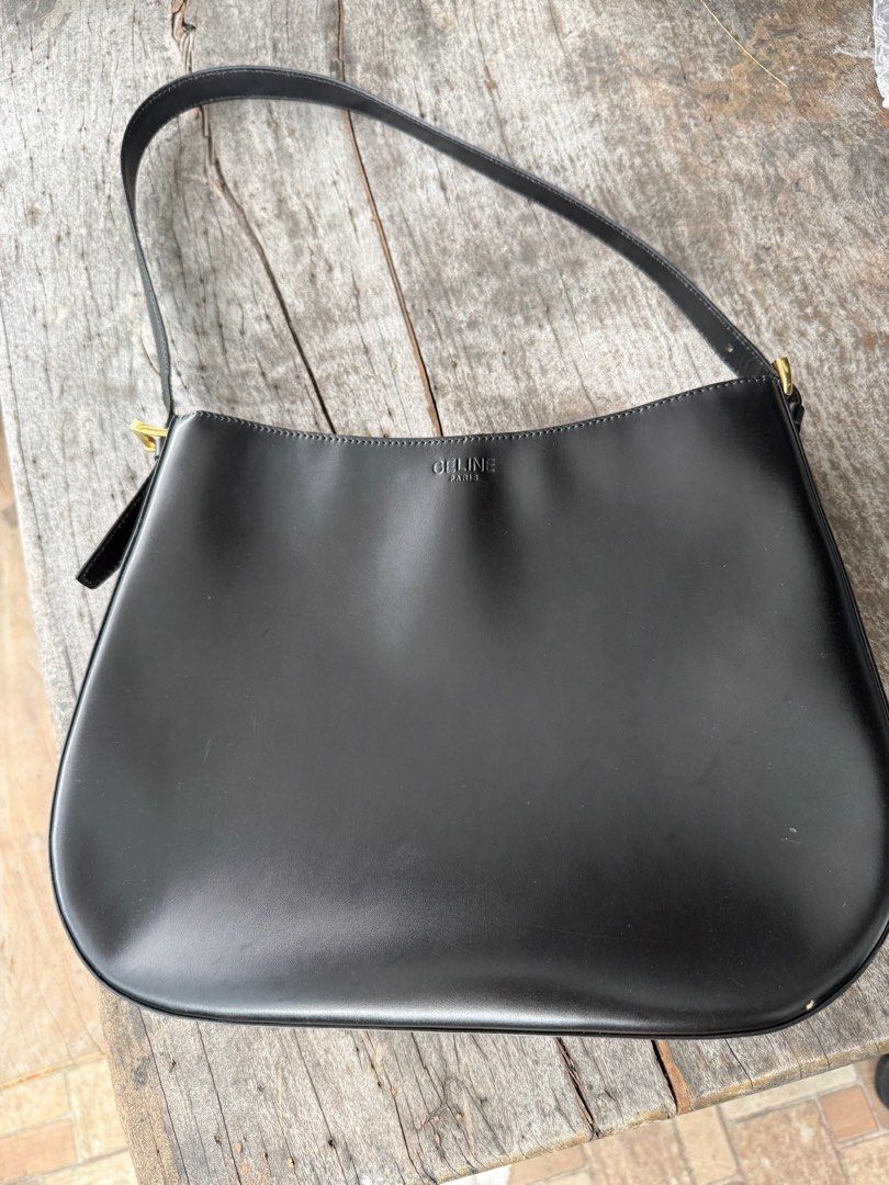 Celine bag (Category: Shoulder Bags) located in Caloocan City. Submitted by stash2 (Listing ID 1412933227, Image 1). Description: Vintage Celine in smooth and shiny leather. The bag lining was starting to crack when I got it so I had it replaced with a red velvet material instead. .