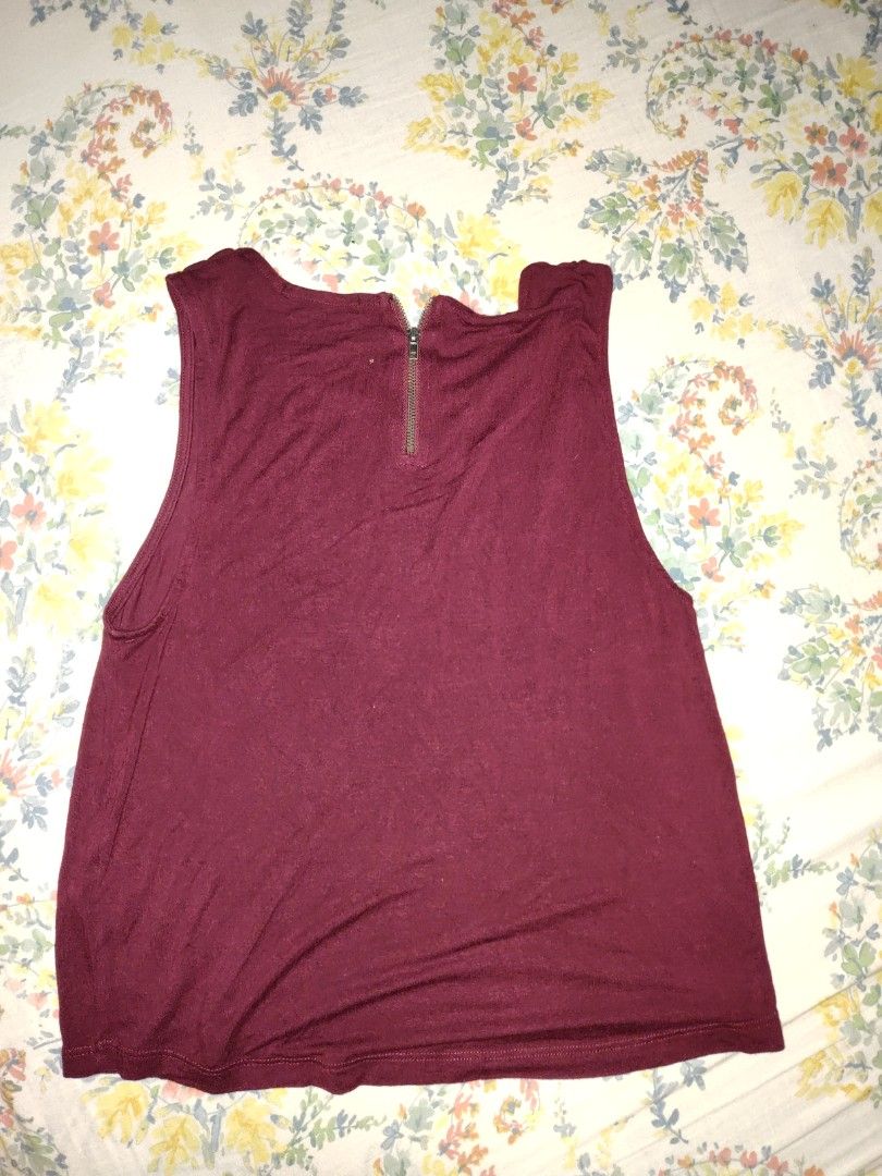 Cotton On Top (maroon) (Category: Sleeveless) located in Caloocan City. Submitted by bluschlez (Listing ID 1412964463, Image 2). Description: maroon zips at the back issue: pinhole (pls see 3rd pic) not obvious size xs but fits up to medium 95% viscose 5% elastane.