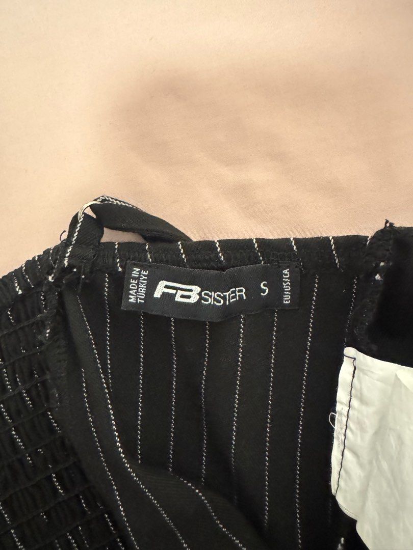 FB Sister Striped Crop Top - Size S (Category: Others Tops) located in Caloocan City. Submitted by shop.ae (Listing ID 1412882143, Image 3). Description: - FB Sister crop top - Black and white striped pattern - Size S - Adjustable straps - Smocked back for a comfortable fit.