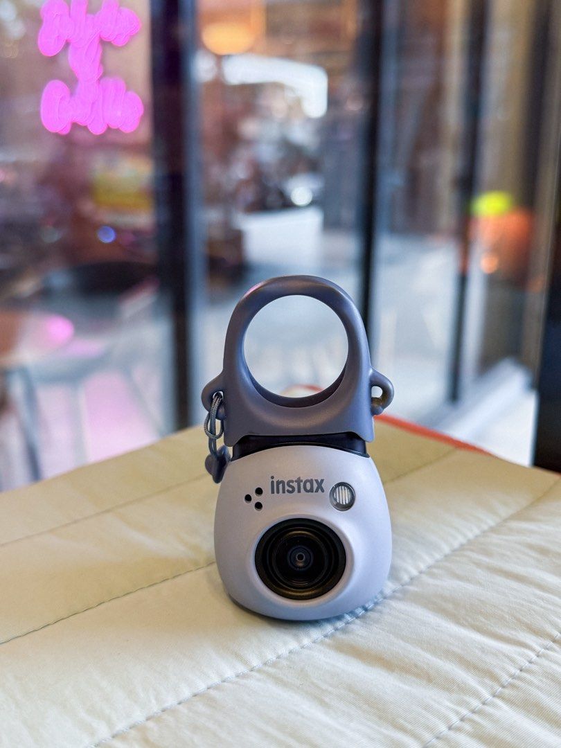Fujifilm Instax PAL Mini Camera (Category: Cameras) located in Valenzuela. Submitted by primerajuana (Listing ID 1412978926, Image 3). Description: In blue. Excellent condition. All accessories in the photo included (panda pouch serves as the case hehe). RFS: Rarely used, decluttering.