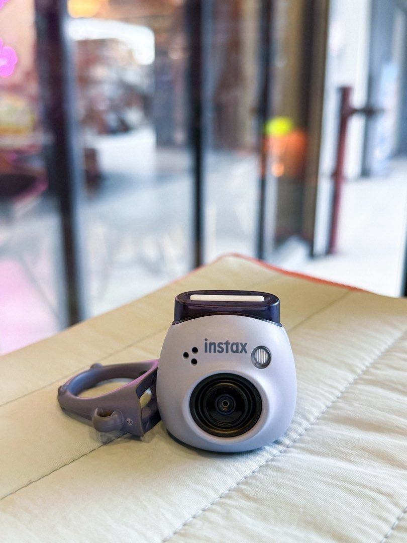 Fujifilm Instax PAL Mini Camera (Category: Cameras) located in Valenzuela. Submitted by primerajuana (Listing ID 1412978926, Image 2). Description: In blue. Excellent condition. All accessories in the photo included (panda pouch serves as the case hehe). RFS: Rarely used, decluttering.