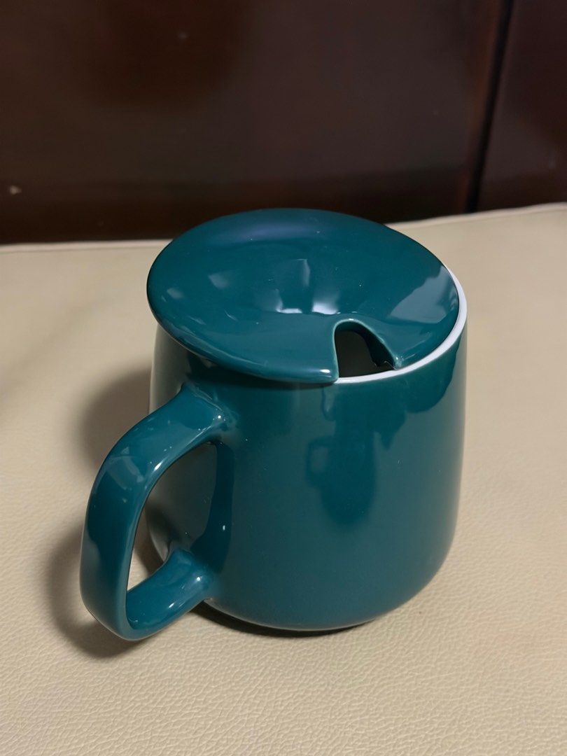 Green Ceramic Mug Set with Lid and Teddy Bear (Category: Coffee & Tea Tableware) located in Manila. Submitted by eksenadora (Listing ID 1412862648, Image 3). Description: - Green ceramic mug with lid - Features a 'lucky' print - Includes a small teddy bear - Comes in a gift box with a gold rope handle - Gift box includes the quote: "Enjoy life, start with a glass of water to make each day count." Location: Sampaloc, Manila Price: P200 MOP: gcash 