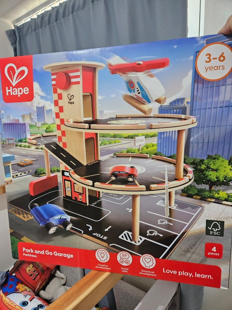 Hape Park and Go Garage (Category: Kids Toys) located in Pasig City. Submitted by trisporthunter (Listing ID 1412903587, Image 2). Description: for sale bnew hape car park. cheaper then srp. .
