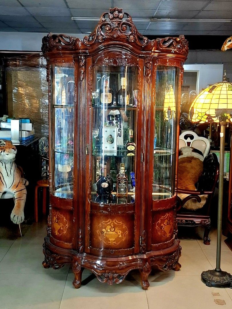 Italian Curio Cabinet (Category: Shelves, Cabinets & Racks) located in Malabon City. Submitted by justineevglst (Listing ID 1413010386, Image 1). Description: - Italian curio cabinet - Rich, dark wood finish - Intricate carvings - Glass doors and shelves - Perfect for displaying collectibles - Dimensions: 79" height, 42" width, 18" depth - Origin: Japan.