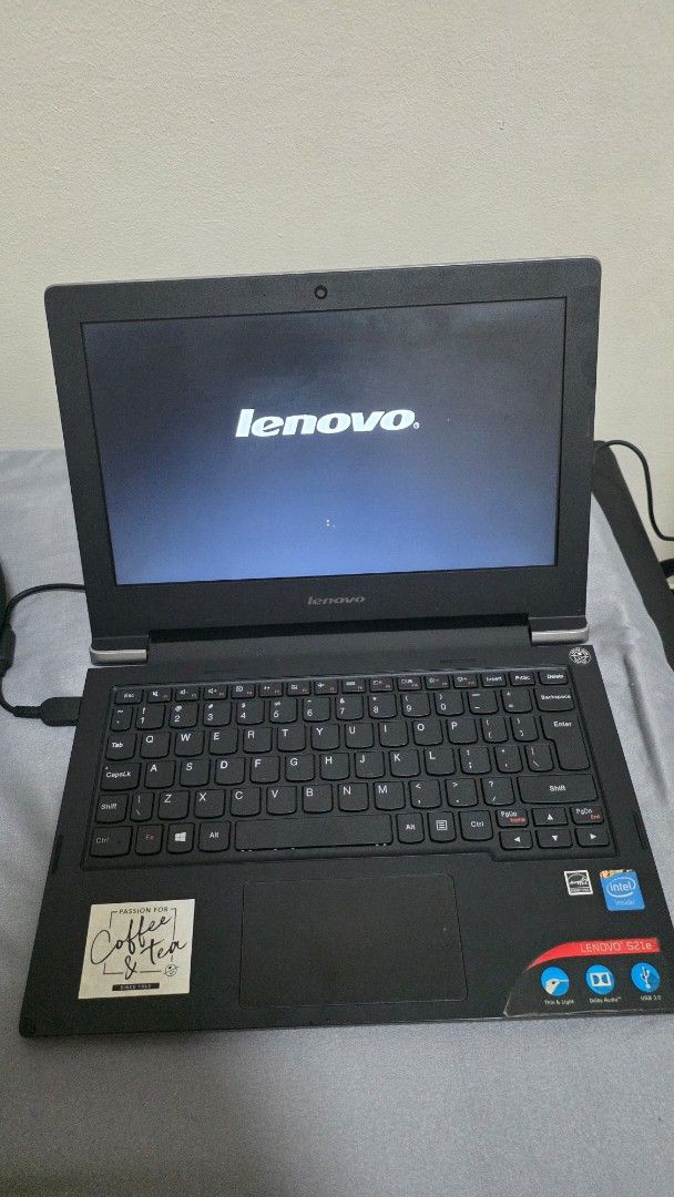 Lenovo Laptop S21e (Category: Laptops & Notebooks) located in Marikina City. Submitted by wynlzr3 (Listing ID 1413011685, Image 2). Description: - Lenovo laptop - Windows 8.1 - Black body - Includes charger - Intel CPU - 2GB RAM - Stickers on the back Naka stock lang sa cabinet, never been used in a long time No time to test other functionalities (buy at your own risk) RFS: decluttering shipping via lalamove w/in metro manila (c/o buyer).