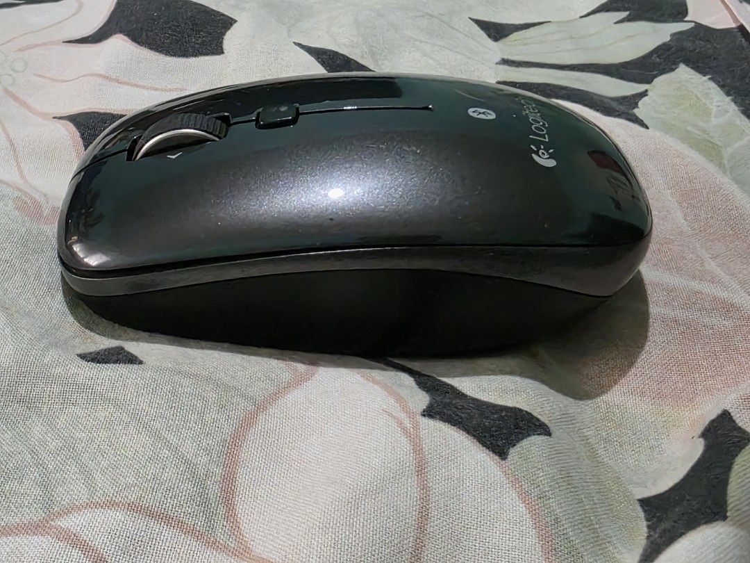 Logitech M557 Bluetooth Mouse Black (Category: Mouse & Mousepads) located in Marikina City. Submitted by happy_watchlover (Listing ID 1412890329, Image 3). Description: In very good working condition. No more box. RFS: Decluttering. Fixed price already. Meetups: BGC Area every MWF and Marikina area on TTh and weekends. Shipping fee to be shouldered by buyer..