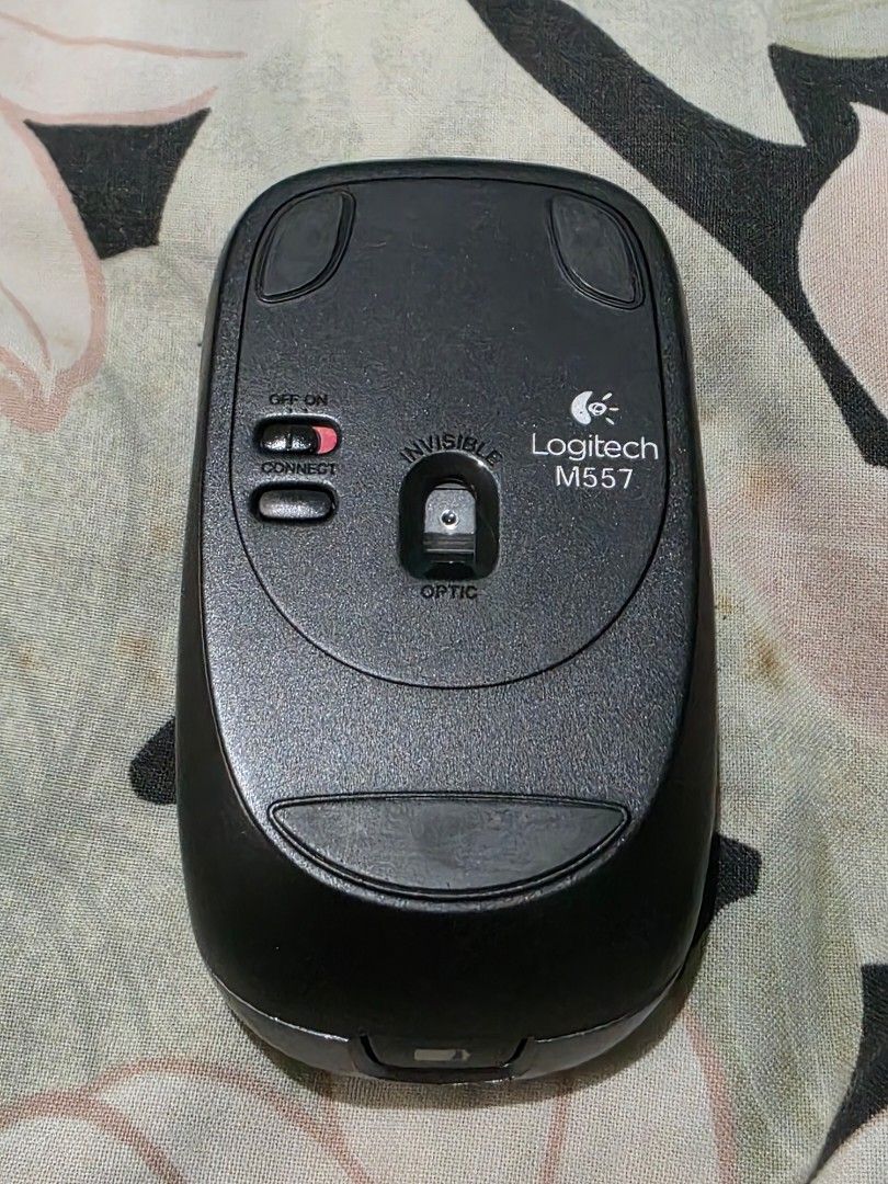 Logitech M557 Bluetooth Mouse Black (Category: Mouse & Mousepads) located in Marikina City. Submitted by happy_watchlover (Listing ID 1412890329, Image 2). Description: In very good working condition. No more box. RFS: Decluttering. Fixed price already. Meetups: BGC Area every MWF and Marikina area on TTh and weekends. Shipping fee to be shouldered by buyer..