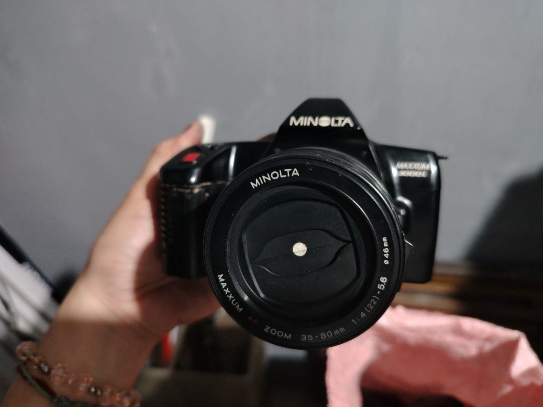 Minolta Maxxum 3000i Camera with Lens (Category: Cameras) located in Quezon City. Submitted by mary.marcel (Listing ID 1412988793, Image 2). Description: - Minolta Maxxum 3000i camera - Includes Maxxum AF Zoom 35-80mm 1:4(22)-5.6 lens - Black camera body rfs - decluttering price negotiable .