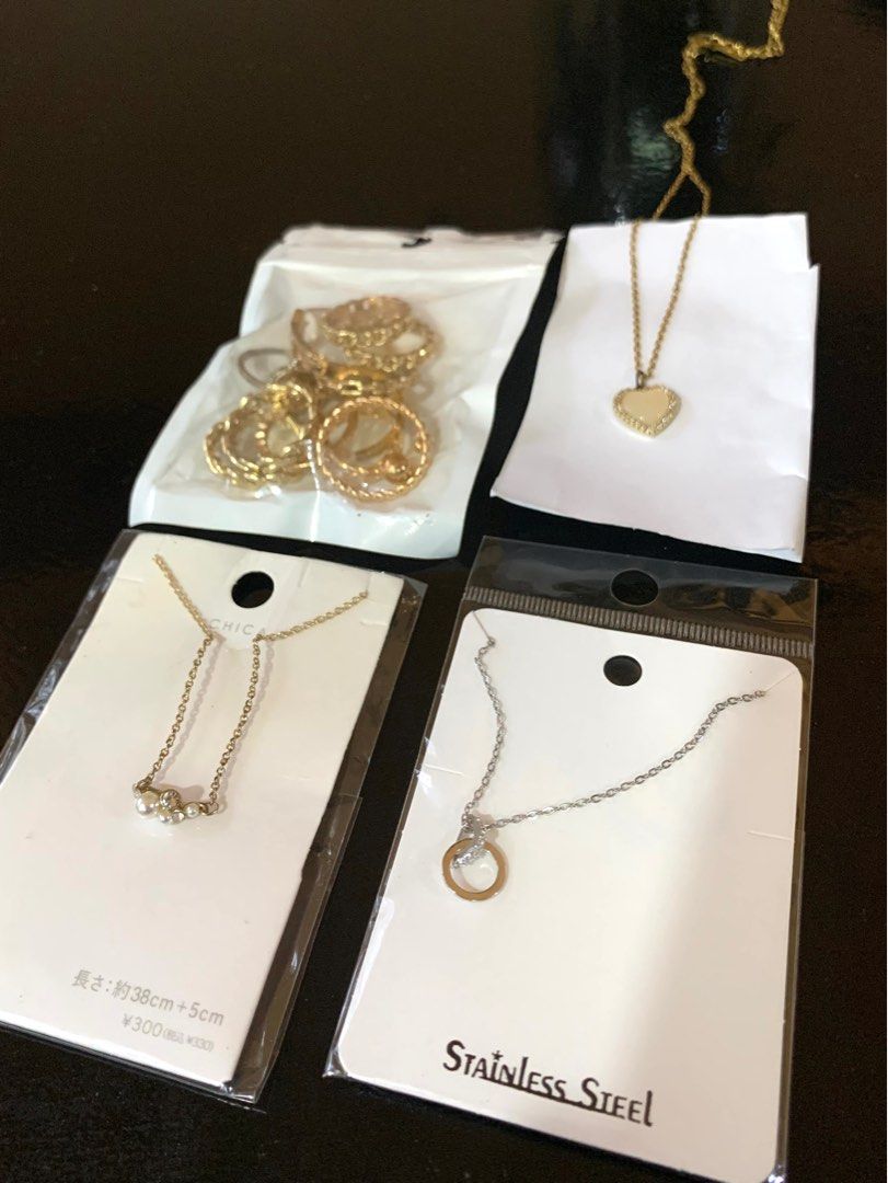 Necklace and Rings Jewelry Bundle (Category: Necklaces) located in Pasig City. Submitted by beans123_ (Listing ID 1412960899, Image 2). Description: Jewelry Set ✨ - Heart pendant necklace - Silver circle pendant necklace (stainless steel) - Stone necklace - Gold rings Set Never worn out, just tried once to check the sizes .