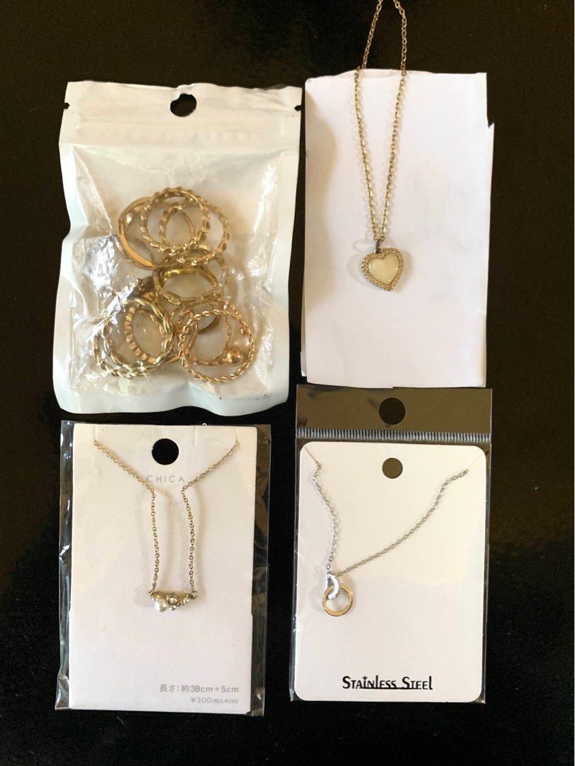 Necklace and Rings Jewelry Bundle (Category: Necklaces) located in Pasig City. Submitted by beans123_ (Listing ID 1412960899, Image 1). Description: Jewelry Set ✨ - Heart pendant necklace - Silver circle pendant necklace (stainless steel) - Stone necklace - Gold rings Set Never worn out, just tried once to check the sizes .