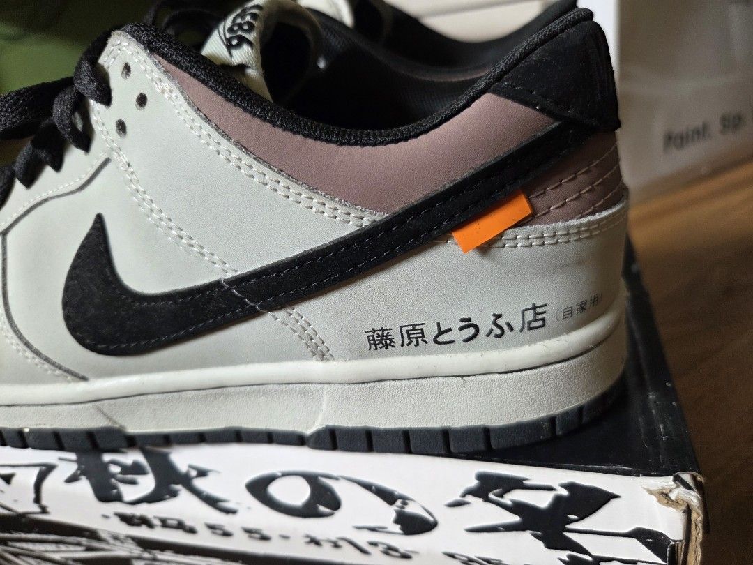 Nike Dunk Low Inital D AE86 (Category: Sneakers) located in Marikina City. Submitted by jerencinas (Listing ID 1412891592, Image 3). Description: - Nike Dunk Low AE86 sneakers - Color: White, black, and orange - Size: US 8.5 - Includes original box.