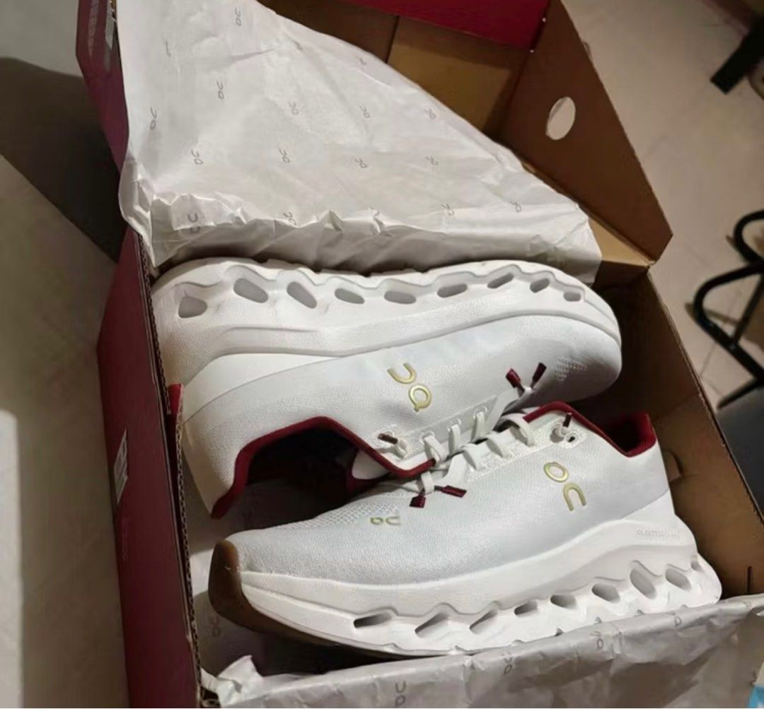 OC UA Running Shoes White Red (Category: Sneakers) located in Manila. Submitted by wantoneyyt18 (Listing ID 1413025960, Image 3). Description: Size 40 - On Cloudnova running shoes - Color: White with red accents - Features the On logo - Unique sole design - No damage condition - Comes with original box.
