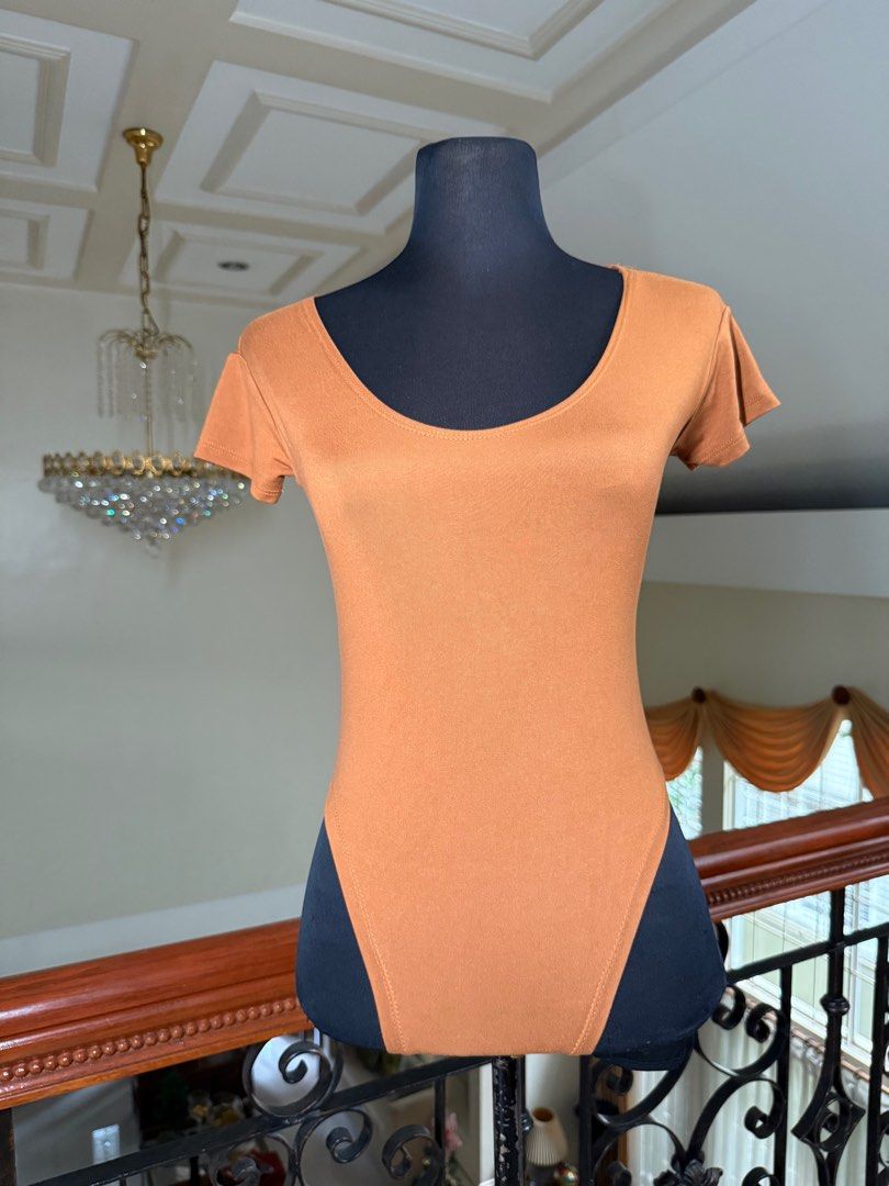 Orange Swimmy Fit Bodycon top (Category: Blouses) located in Makati City. Submitted by VersatileBabe (Listing ID 1413028601, Image 2). Description: .