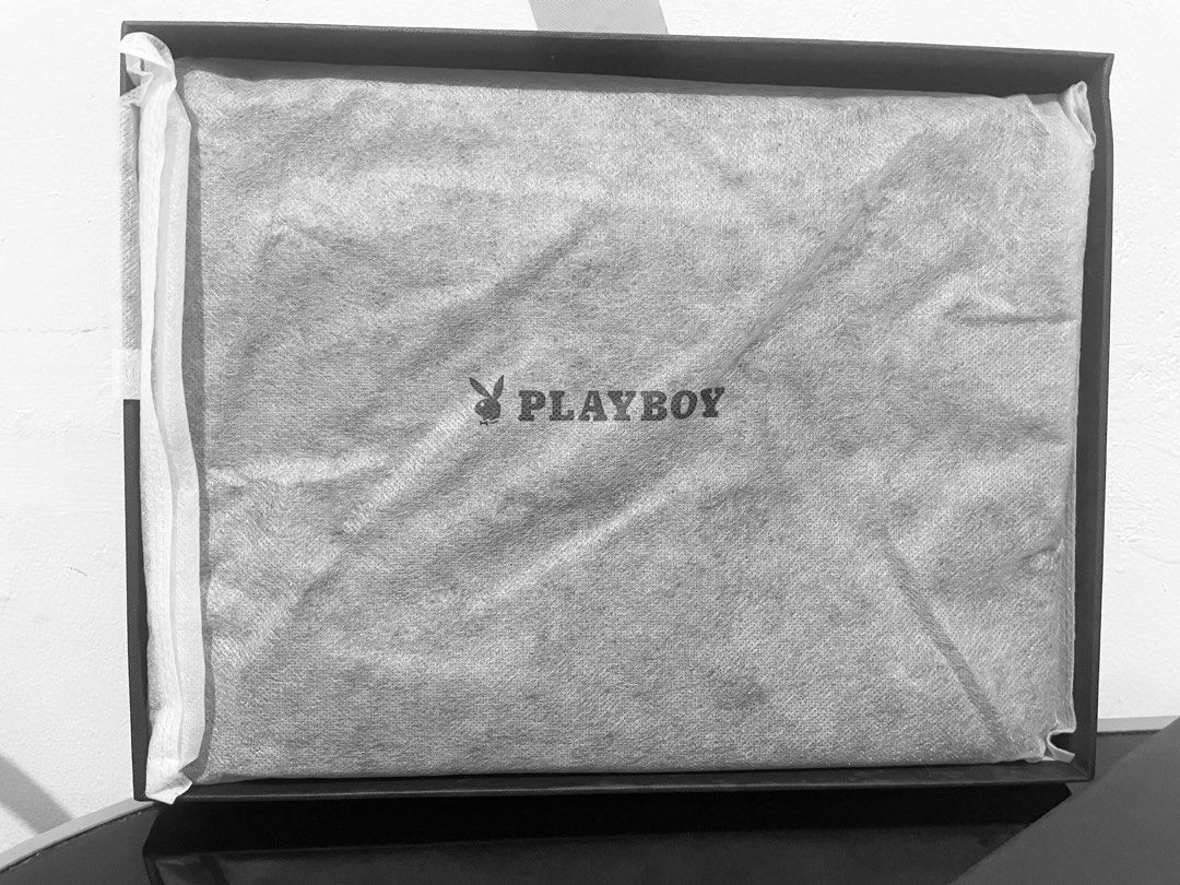 playboy Clutch or laptop bag (Category: Luxury Bags & Wallets) located in Binan City. Submitted by winds06 (Listing ID 1412936939, Image 2). Description: Rush sale. selling my brandnew clutch bag with wrist strap. guaranteed authentic. with box, dust bag, tag is intact. rfs: Rush! need FUNDS..