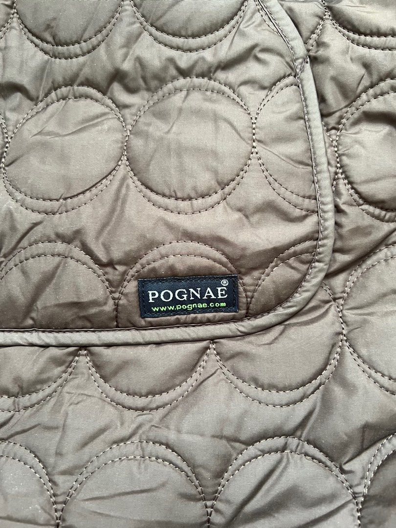 POGNAE Baby Stroller Footmuff (Category: Strollers) located in Binan City. Submitted by finders_market (Listing ID 1412867643, Image 2). Description: POGNAE footmuff is designed to keep your baby warm and cozy. It features a quilted design with a hood and a front pocket. The footmuff has a zipper closure and adjustable straps for a secure fit. The footmuff is brown in color. Brand new removed tags only never been used.