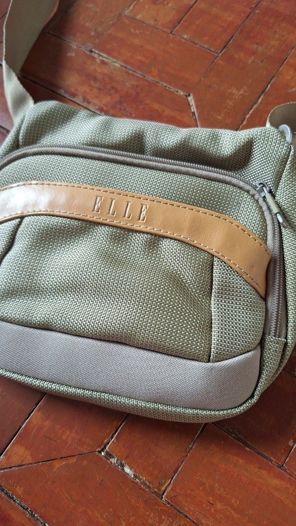 Small ladies body bag (Category: Shoulder Bags) located in Marikina City. Submitted by thesecondroomph (Listing ID 1412874042, Image 2). Description: Casual ladies body bag, small, has compartments inside issue: zippers are no longer aesthetic but still work (see photos).