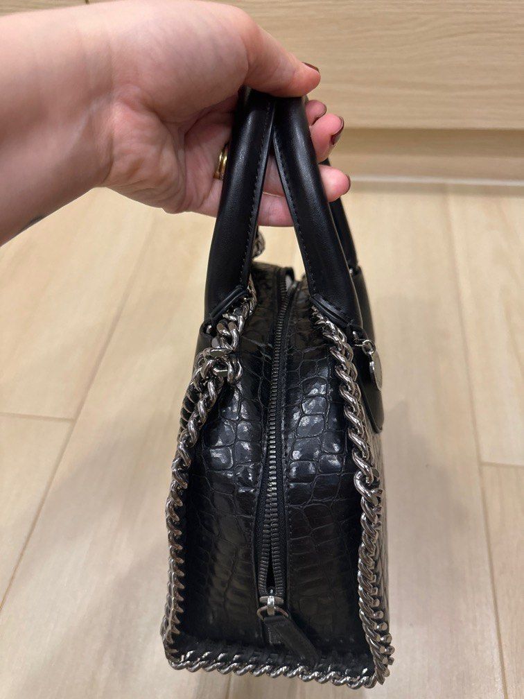 Stella McCartney Falabella Box Top handle with strap (Category: Luxury Bags & Wallets) located in Manila. Submitted by stashandslay (Listing ID 1412928067, Image 2). Description: Selling Low 💕 Slightly used and well-loved, but never abused. The leather near the zipper has developed some cracking and chipping due to humidity while in storage (please see photos for the condition). Priced low to reflect the flaw. ✨ Comes with dust bag and cards. Pl