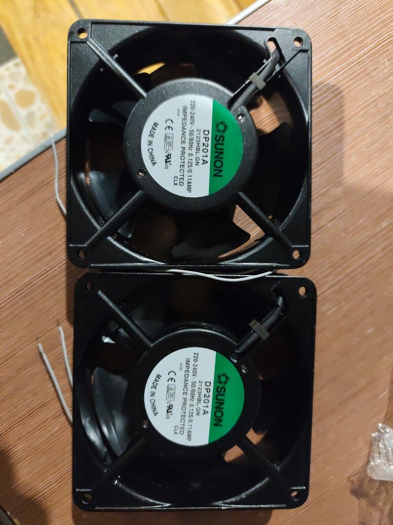 Sunon DP201A Fan - AC Axial fan (Category: Industrial Equipment) located in Manila. Submitted by peterjohn00008 (Listing ID 1412980700, Image 1). Description: - Sunon DP201A fans - Black frame and blades - 220-240V, 50/60Hz, 14W - Square shape - Includes wires for connection - Sunon brand - 500 for both.