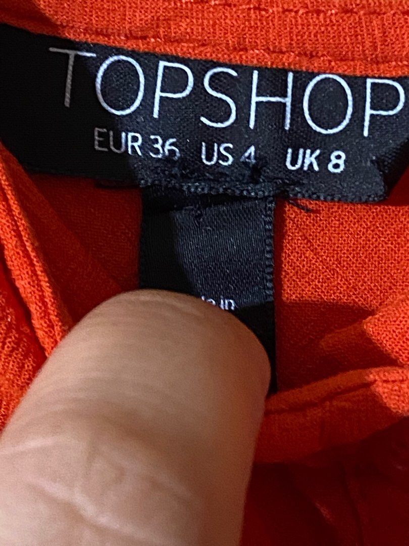Topshop Orange Midi Dress (Category: Dresses) located in Pasay City. Submitted by _jkching (Listing ID 1413021364, Image 3). Description: - Topshop orange midi dress - Tie detail at waist - Button-down front - Cutout detail under bust - Spaghetti straps - Midi length - Size: EUR 36, US 4, UK 8.